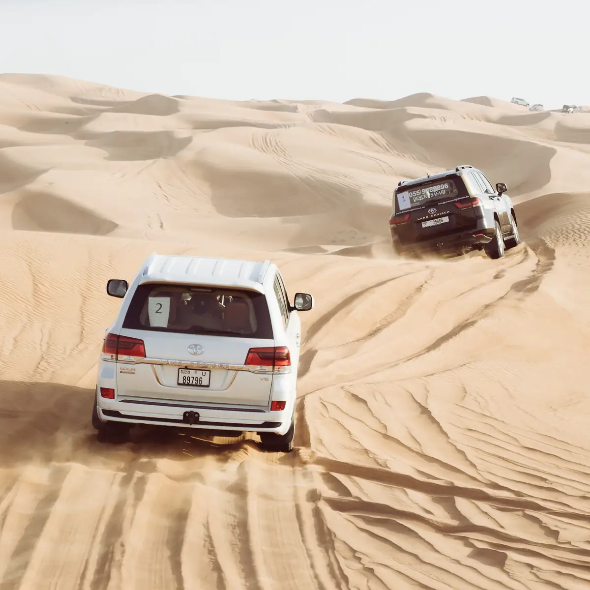 4x4 stuck in desert sand being recovered in the UAE