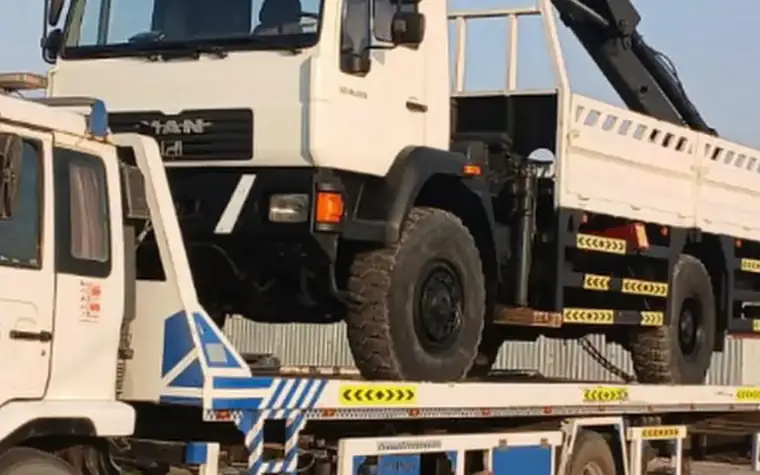 MZ Meer heavy duty recovery truck transporting a crane vehicle