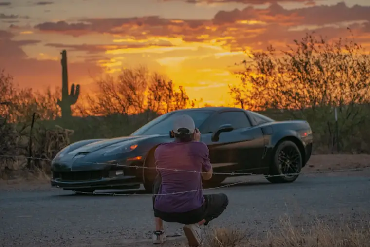 Luxury sports car prepared for flatbed transport